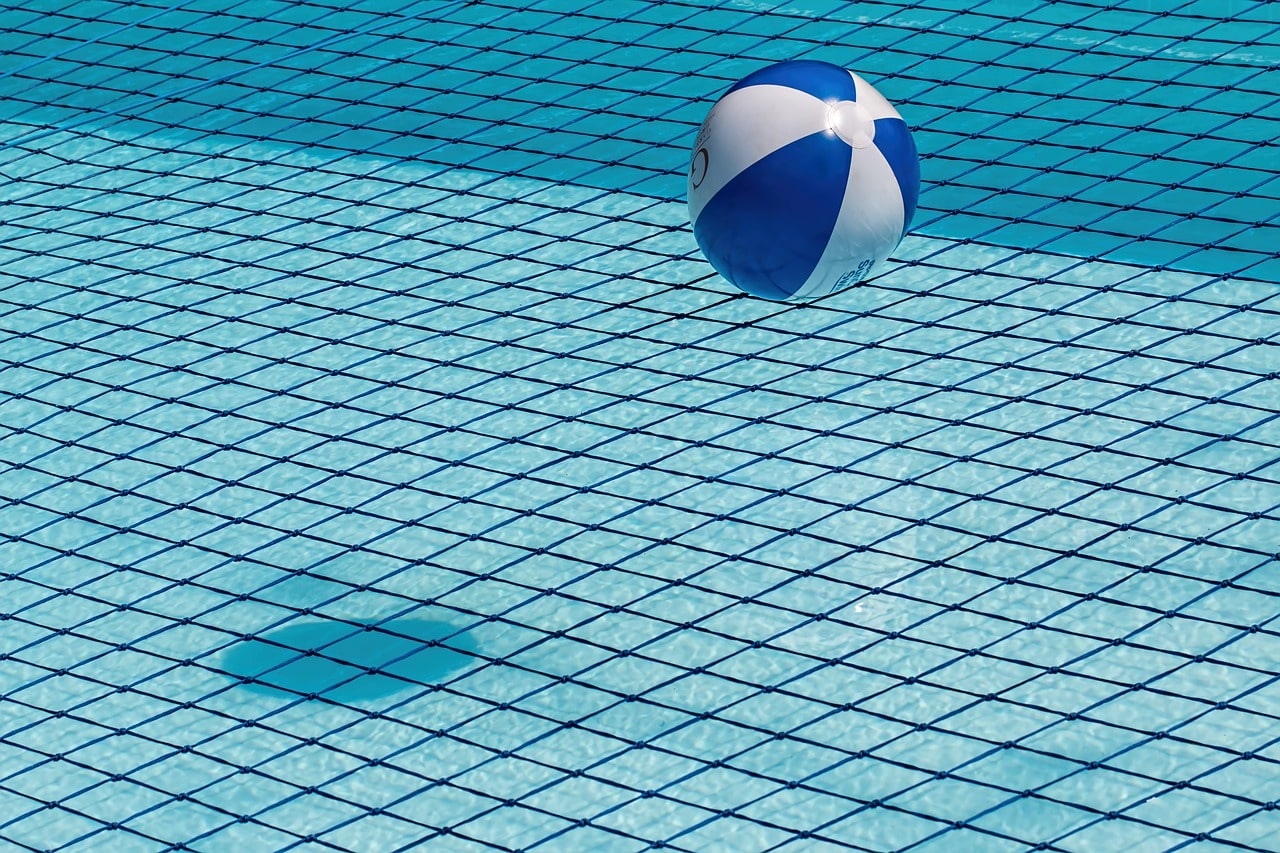 Beach ball in a pool.