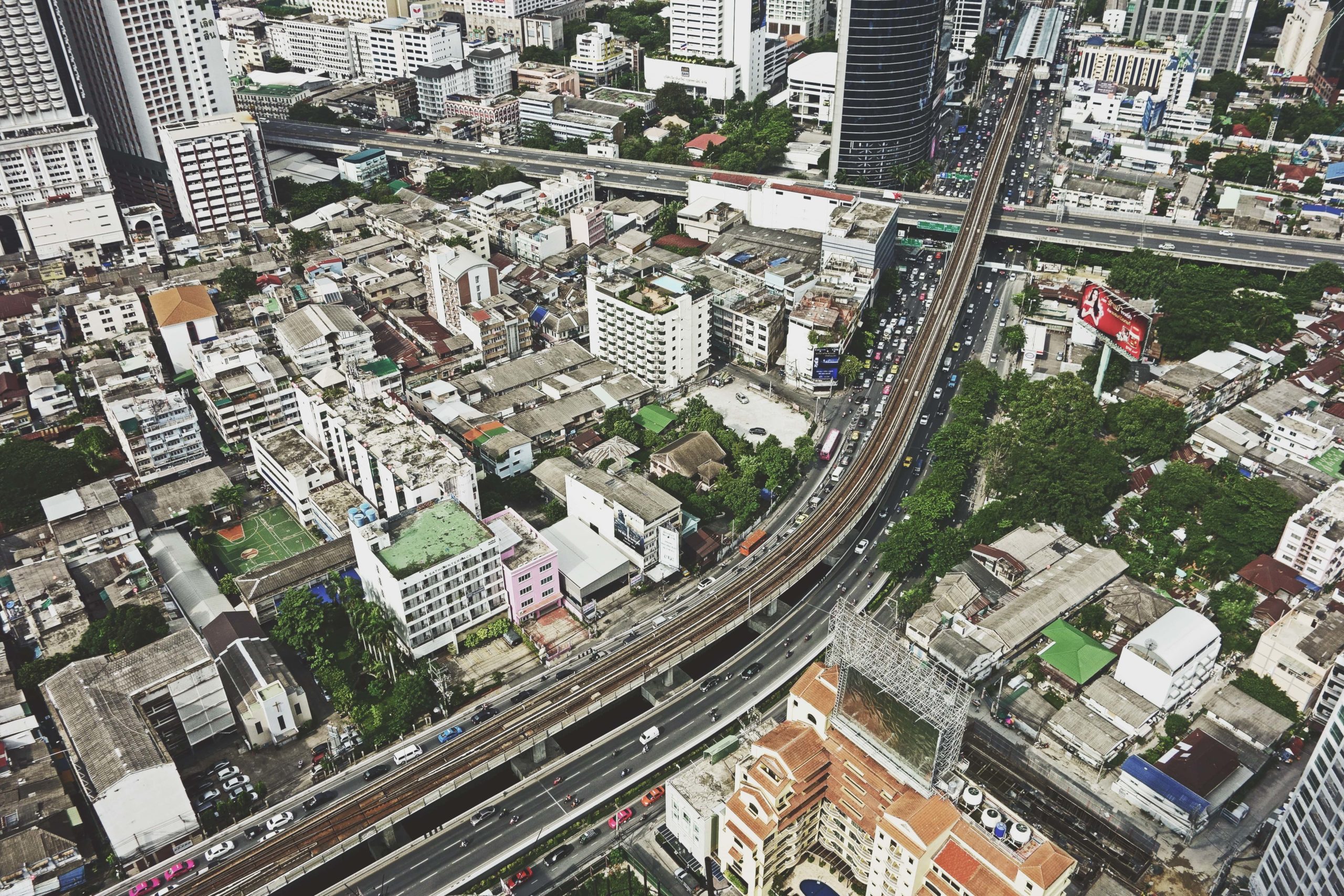 An aerial shot of people moving through a city.